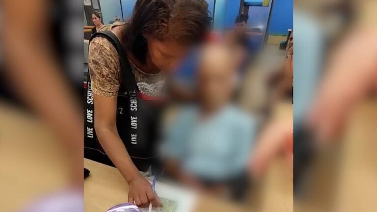 امرأة تصطحب جثة إلى بنك للتوقيع على طلب قرض (فيديو)